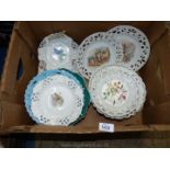 A quantity of Ribbon plates decorated with fruit, flowers and cherubs, etc.