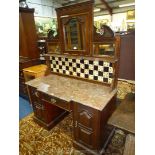 An imposing circa 1900 Mahogany break-front Washstand having a tiled upstand with shaped bevelled