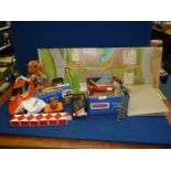 A quantity of miscellaneous toys including; a wind up Porsche car with key (A/F) boxed,