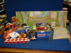 A quantity of miscellaneous toys including; a wind up Porsche car with key (A/F) boxed,