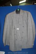 A pure new wool Austin Reed Suit in Prince of Wales check, double breasted jacket 44'' chest,