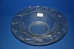 A vintage Art glass bowl with raised swallow motif to wide rim, 13" diameter.