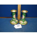 A scarce pair of Jacob Petit small porcelain candlesticks, c.