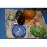 A large quantity of miscellaneous coloured glass including trifle dishes, vases, jug,