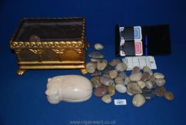 A Bridge card set, decorative stones, a gilt jardiniere and a stone hippopotamus.