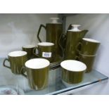 A Coffee service in green and white (all saucers marked Beswick)