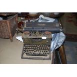 An Imperial typewriter a/f. and cover.