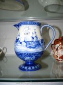 A pretty Doulton Burslem bulbous blue and white Jug decorated with sailing ships,