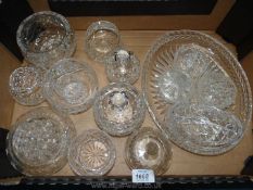 A quantity of cut glass Rose bowls including Edinburgh Crystal, lidded pots,