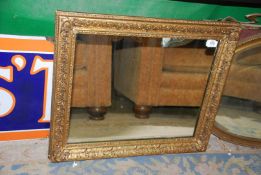 An ornate gilt framed Mirror,