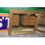 An ornate gilt framed Mirror,