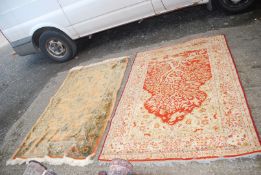 Two bordered patterned and fringed Rugs,
