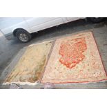 Two bordered patterned and fringed Rugs,