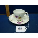 A mid 18th century Meissen academic/dot period cup and saucer painted flowers.