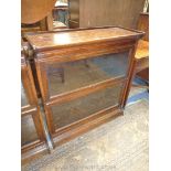 A two stage Oak Globe Wernicke type enclosed Bookcase,