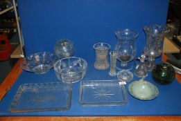 A footed Stuart glass bowl, trays, vases, hurricane lamp, glass fishing floats, candle holder etc.