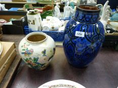 Two oriental Vases, one blue ground, 13 1/2" tall and the other decorated with birds and flowers,