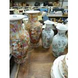 Two pairs of oriental Vases, one pair 12" tall and the other 9 1/2" tall.