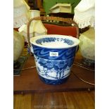 A Booths "Summer Rose" slop pail having original cane handle in a soft steely blue complete with