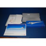 A folder of Concorde memorabilia to include London to Cairo 12th Oct 1986, Concorde model,