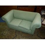 A green fabric upholstered Chesterfield Settee