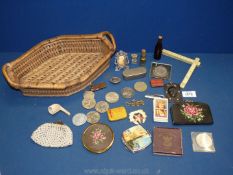 A basket of miscellanea including boxed five shilling coin and other coins, compact,