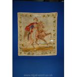 A wall hanging Tapestry depicting a soldier on horseback, worked by "Emma Jane Tromans 1863",