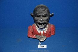 A vintage novelty Money Box in the form of a bust of African gentleman,