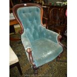 A circa 1900 buttoned back Mahogany framed Armchair,