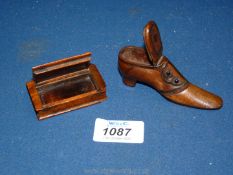 A treen walnut shoe shaped snuff box with opening lid and pique decoration to the sole and upper,