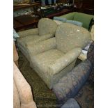 A pair of nicely re-upholstered fireside Armchairs standing on bun front feet and upholstered in