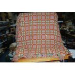 A Welsh blanket in orange and green, double size.