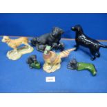 Miscellaneous Labrador figures including two pups playing with green wellies,