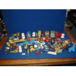 A large quantity of Dinky, Corgi and Matchbox vehicles to include; Police cars, horse box,