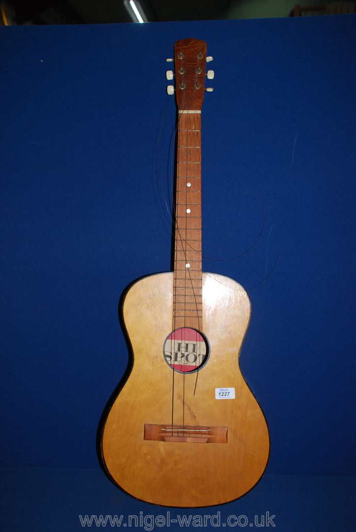 A vintage Hi Spot acoustic Guitar, possibly 1950's, (three broken strings), no case.