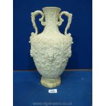 A large two handled classical shaped Copeland vase with elaborate raised decoration of floral and