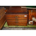 An Oak five drawer Specimen Chest of five graduated drawers,