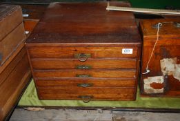 An Oak five drawer Specimen Chest of five graduated drawers,