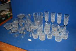 A Nachtmann German vase, ice bucket, Champagne flutes, three Champagne saucers, Sherry glasses, etc.