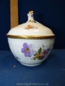 A Royal Copenhagen lidded pot with floral and gilt decoration,