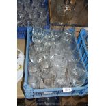 A quantity of mixed glasses including plain wine glasses, cut glass whisky tumblers etc.