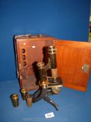 A Victorian brass Microscope in original Mahogany case, fitted with eyepiece,