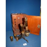 A Victorian brass Microscope in original Mahogany case, fitted with eyepiece,