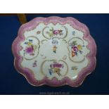 A circa 1900 Dresden tray painted with flowers in the Meissen style within a pink scale border,