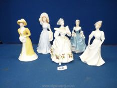 Four Coalport figures and a Royal Doulton figure of the month 'December'.