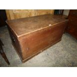 A Pine blanket Box having drop iron carrying handles,