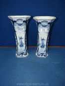 A pair of Delft Holland blue & white trumpet vases with seaside views. 12 " tall.