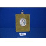 ***A velvet mounted oval framed miniature PRINT of a young girl with large bows in her hair.