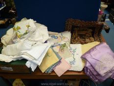A good quantity of linen including embroidered and crocheted tablecloths,