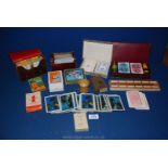 A quantity of various playing cards including boxed set with gaming counters, crib board etc.